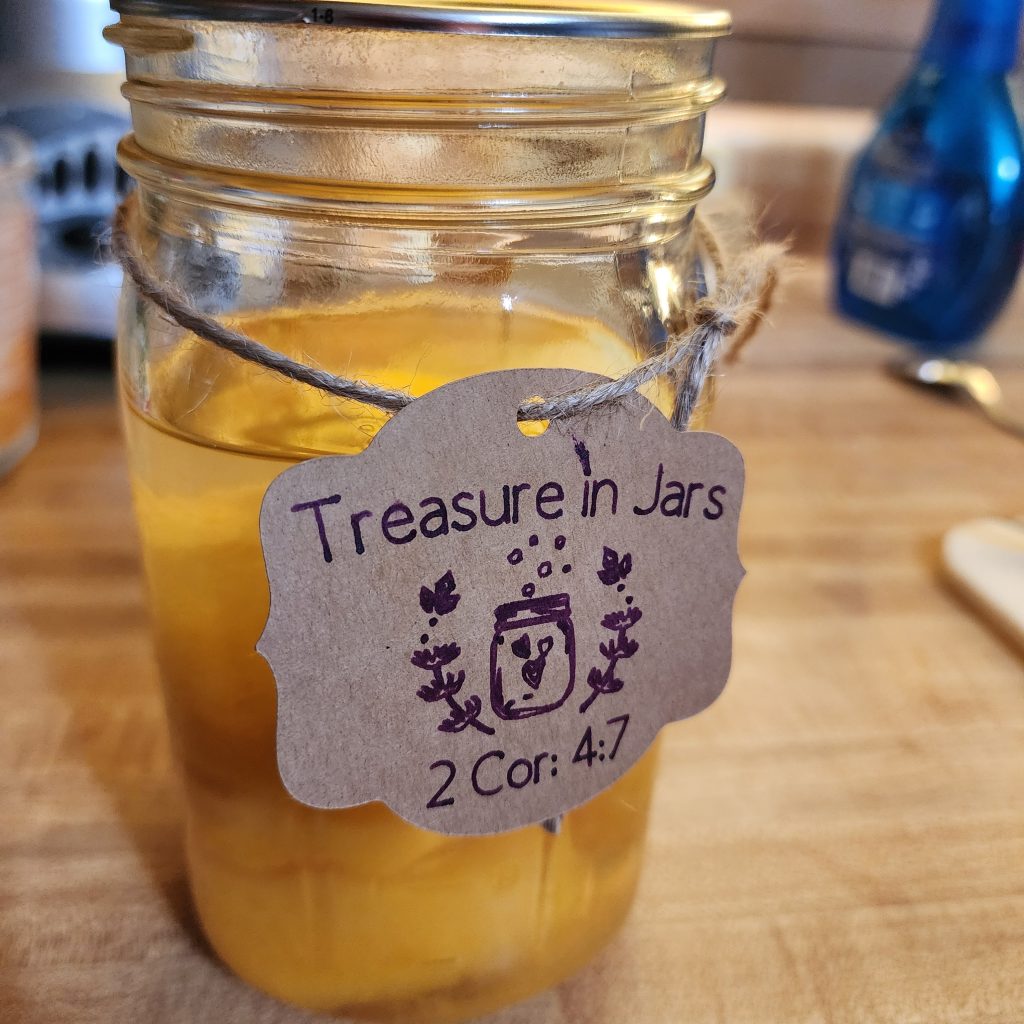 A jar of canned peaches from Treasure in Jars.