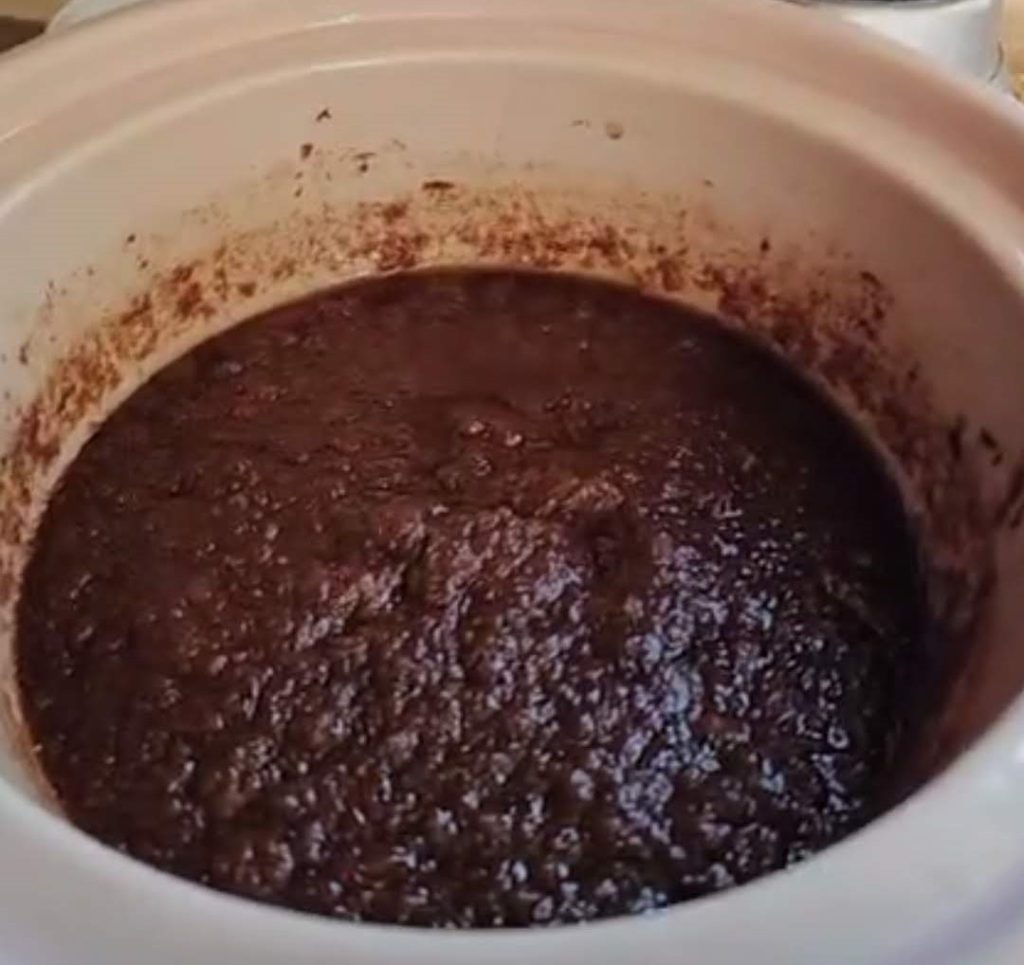 Slow Cooked Spicy Apple-Pear Butter in a crock pot.